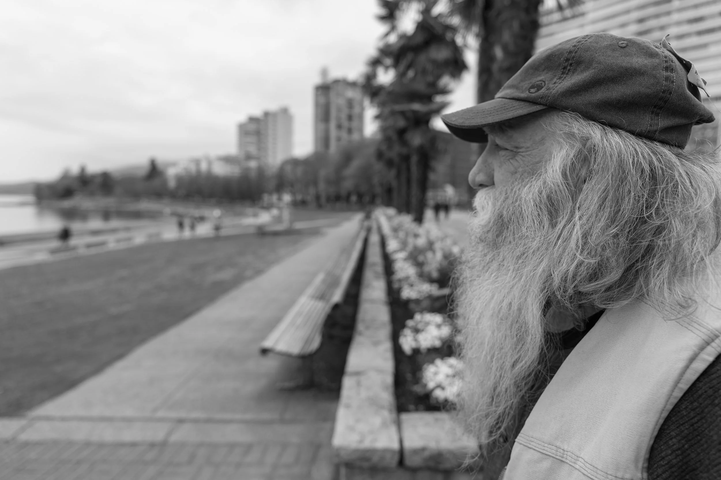 Portrait of an elderly gentleman with a beard. Sample image from a Sigma 15mm f/1.4 DC Contemporary and Fujifilm X-E5.
