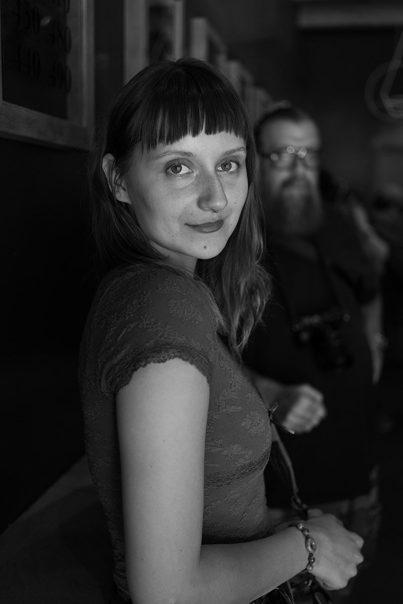 Portrait of a young woman. Sample image from a Sony FE 40mm f/2.5 G and Sony A7 V.