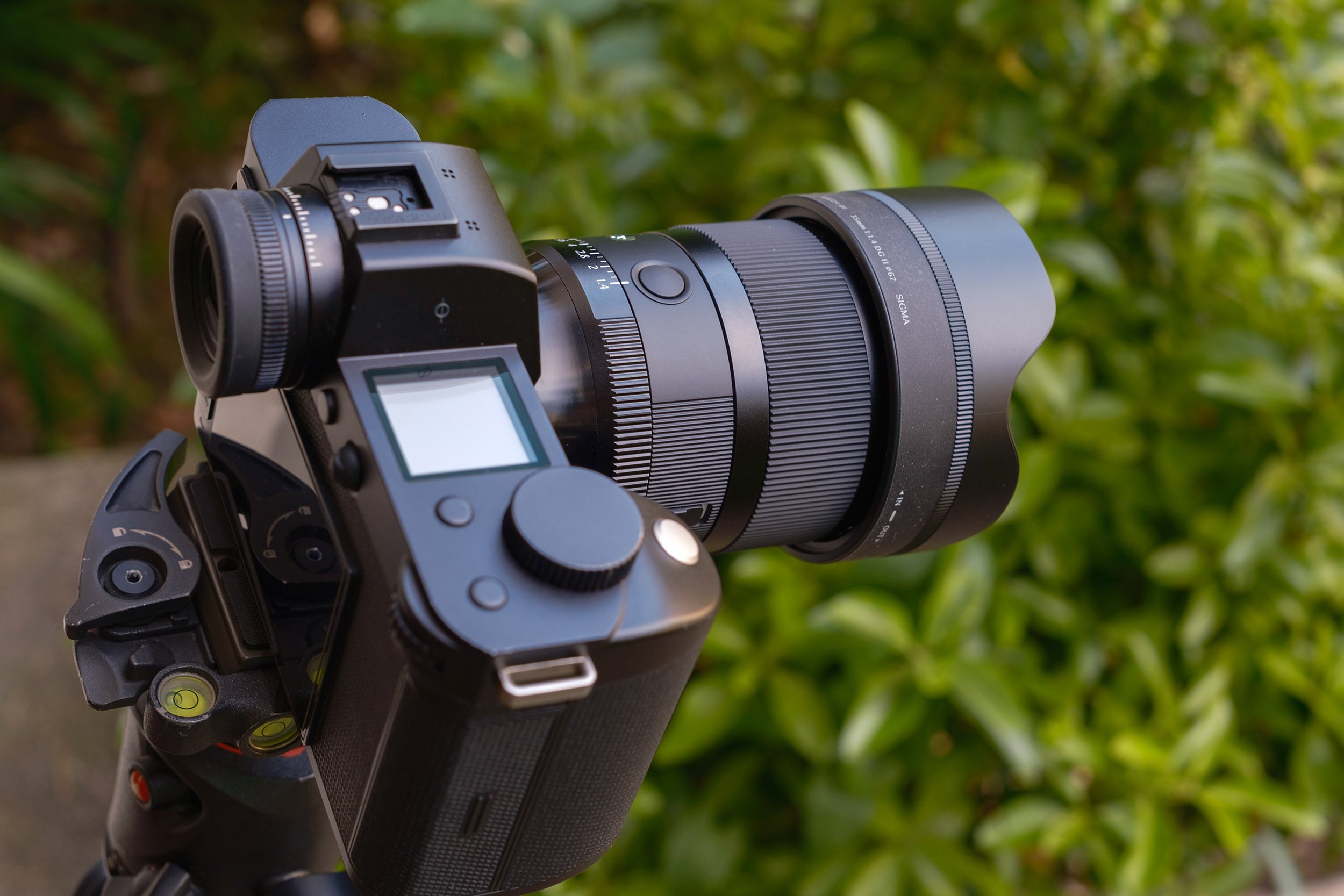 The Sigma 35mm f/1.4 DG II Art with the lens hood shown on a Leica SL2-S