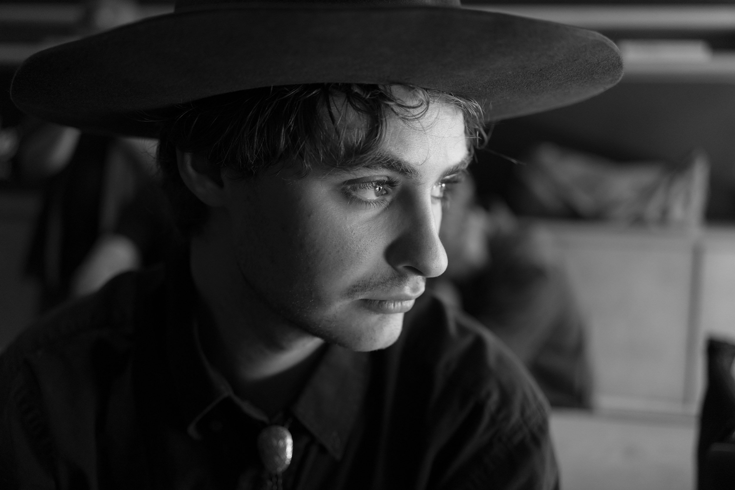 A portrait of a young man. Sample image from a Sony FE 40mm f/2.5 G and Sony A7 V.