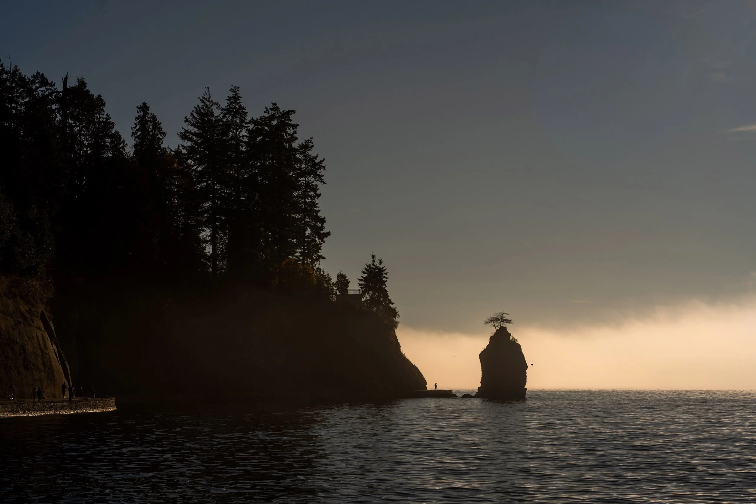 Siwash Rock on the Stanley Park Seawall on a foggy day October day, 2026.