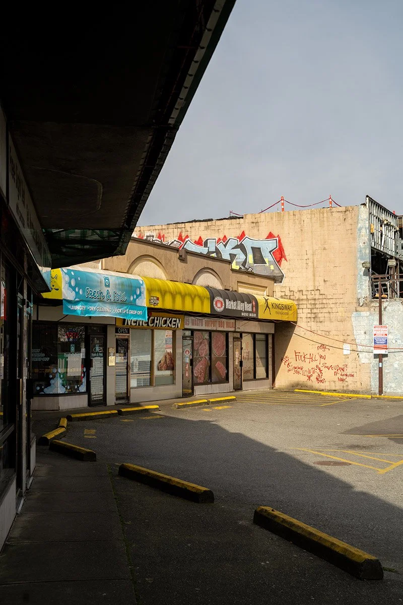 Strip mall along Kingsway in Vancouver. Sample image from a Sony A7R V and Sony FE 50mm f/1.4 GM.
