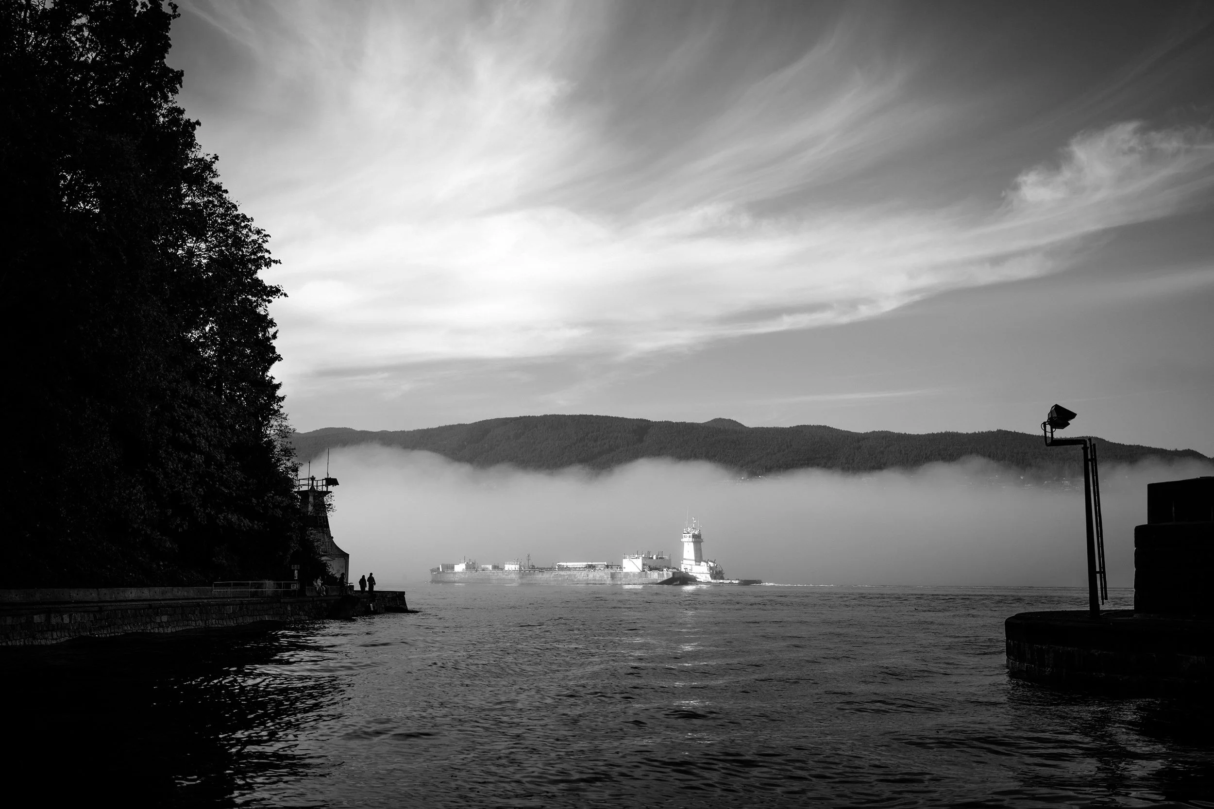 A cargo ship departs from Vancouver Harbour. Sample photo from a Sigma 35mm f/1.4 DG II Art.