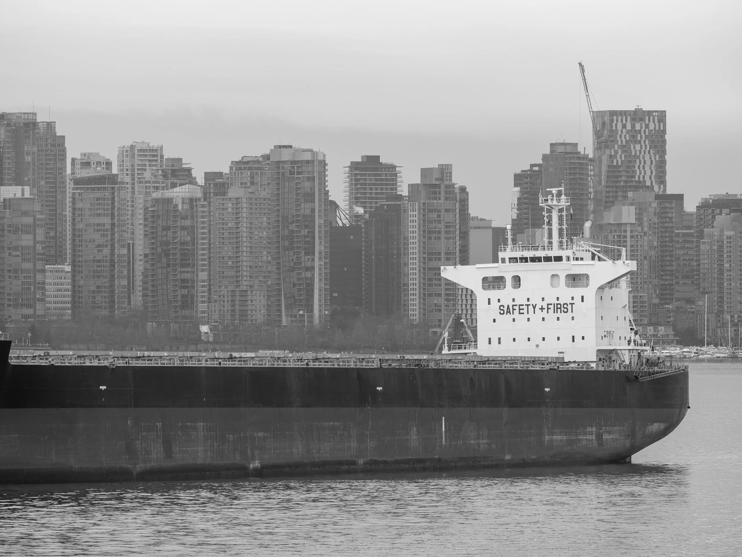 A cargo ship in the Burrard Inlet, Vancouver. Sample image from a Fujifilm GF 500mm f/5.6 R LM OIS WR and Fujifilm GFX 100S II.