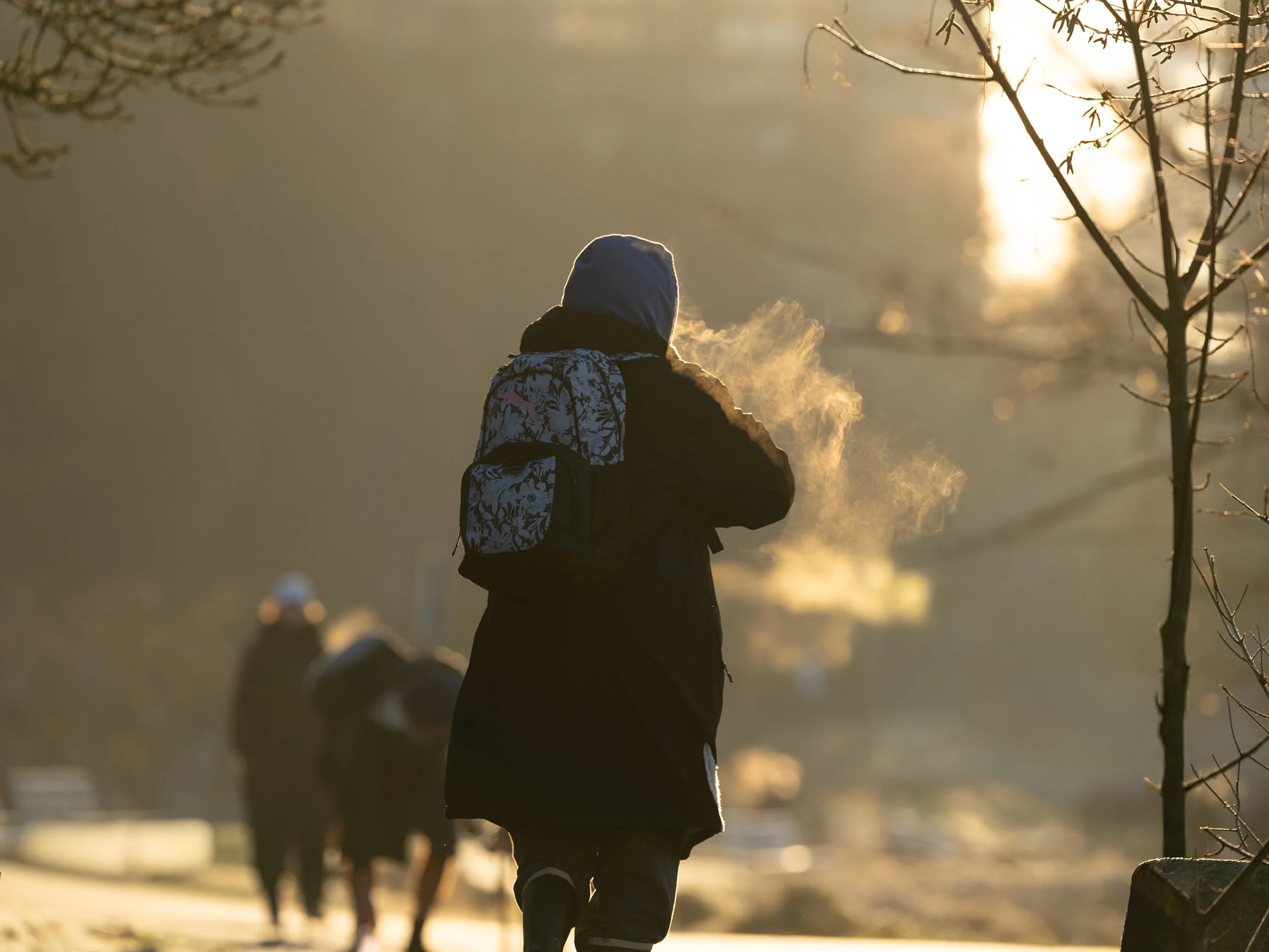 Visible breath on a cold morning, Vancouver West End. Sample image from a Fujifilm GF 500mm f/5.6 R LM OIS WR and Fujifilm GFX 100S II.