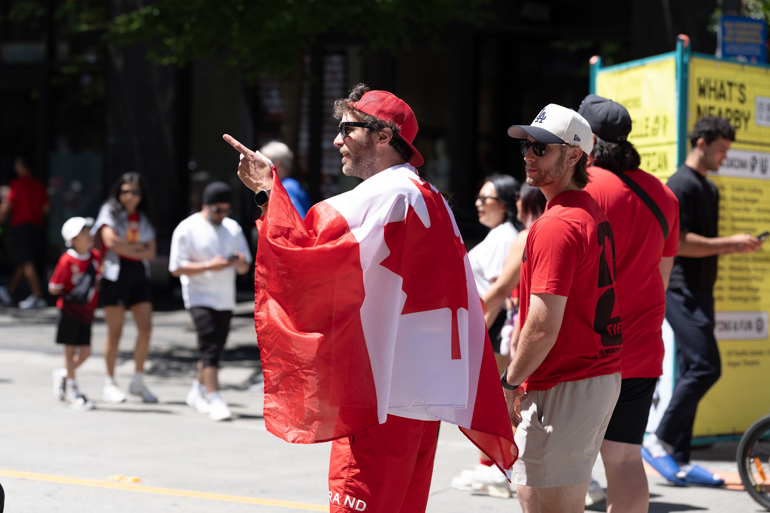 A Canadian soccer supporter on Granville Street in Vancouver, 2026 FIFA World Cup. Sample image from a Sony FE 50-150mm f/2 GM and Sony A7 V.