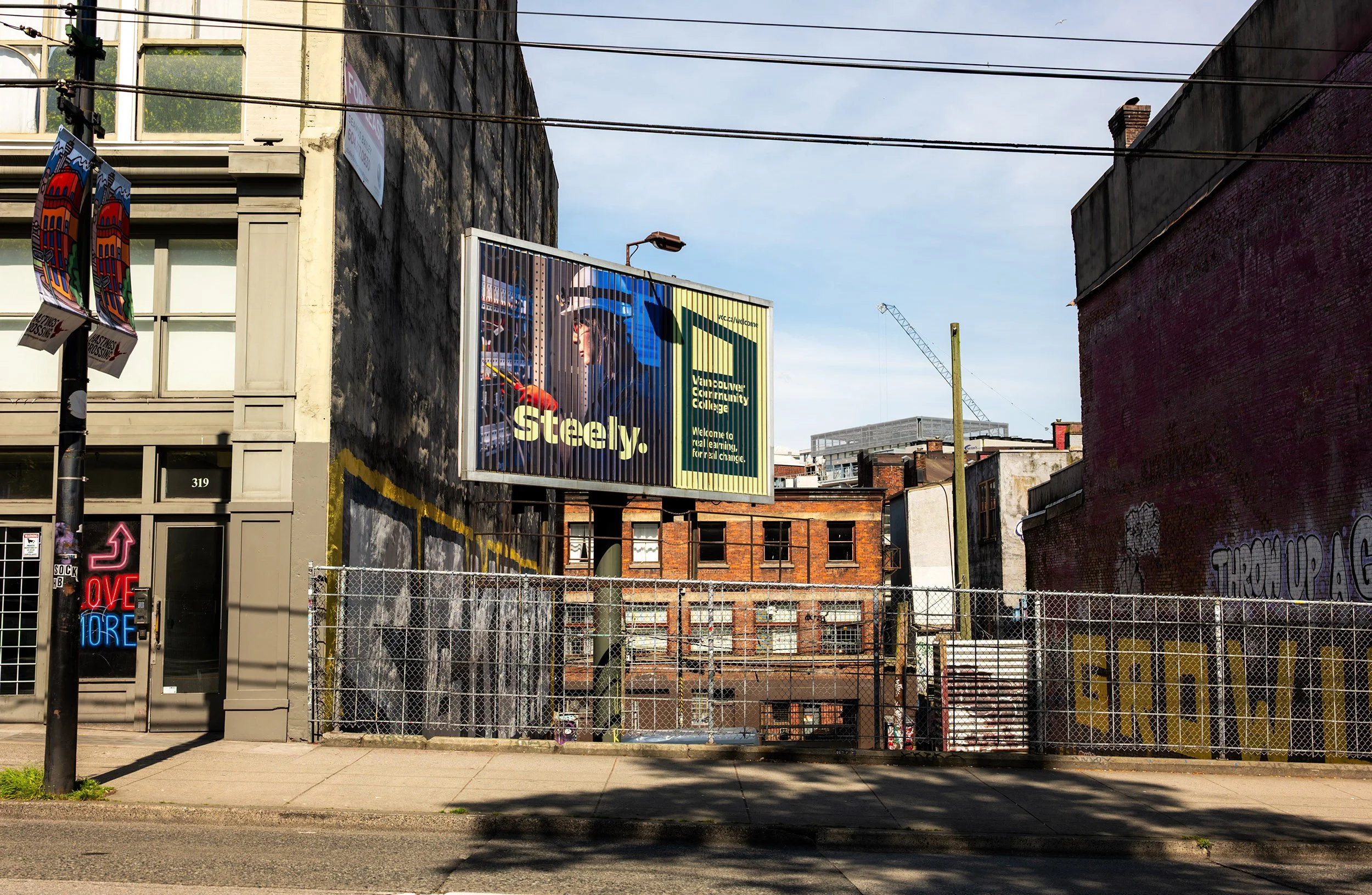 Billboard along West Pender Street in Vancouver. Sample image from a Sigma 35mm f/1.4 DG II Art and Leica SL2-S.