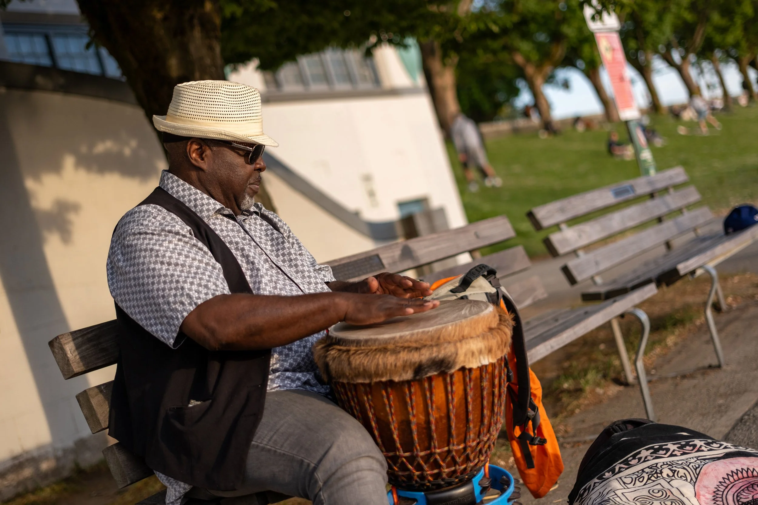 Djembe drummer at English Bay Beach in Vancouver. Sample image from a Fujifilm X-T50 and XF 33mm f/1.4 R LM WR.