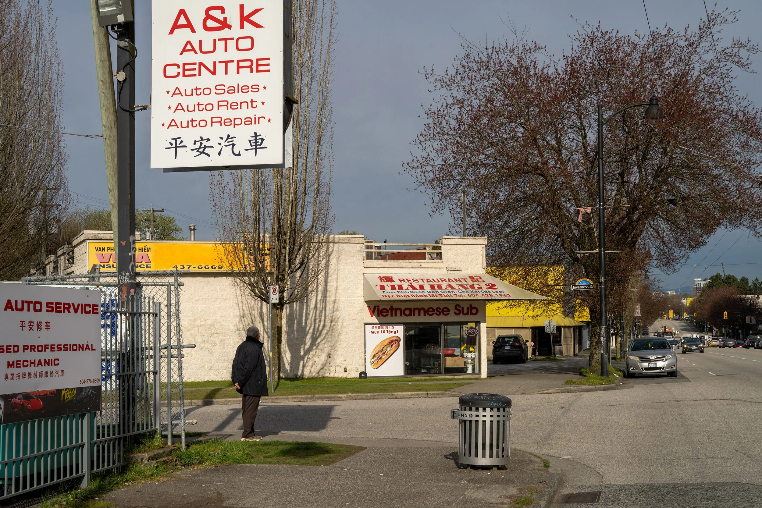 Street photography, Kingsway, Vancouver. Sample image from a Sony A7R V and Sony FE 50mm f/1.4 GM.