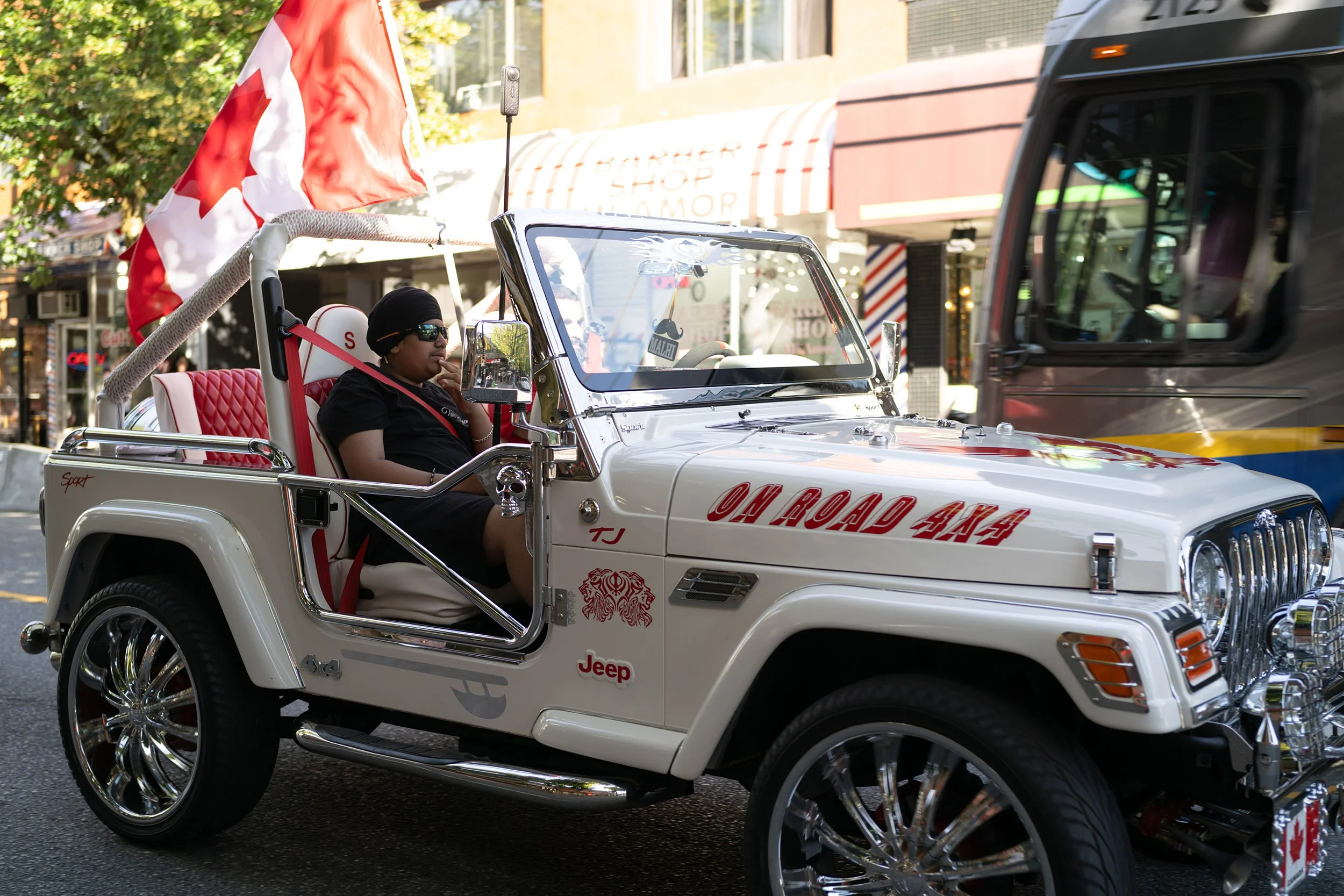Jeep with Canadian Flag on Denman Street after Canada's World Cup win over South Africa, June 28, 2026