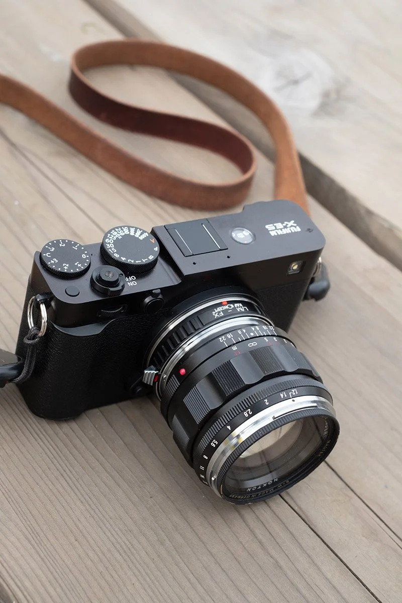 Fujifilm X-E5, black, and Voigtländer Nokton 50mm f/1.2 Aspherical VM