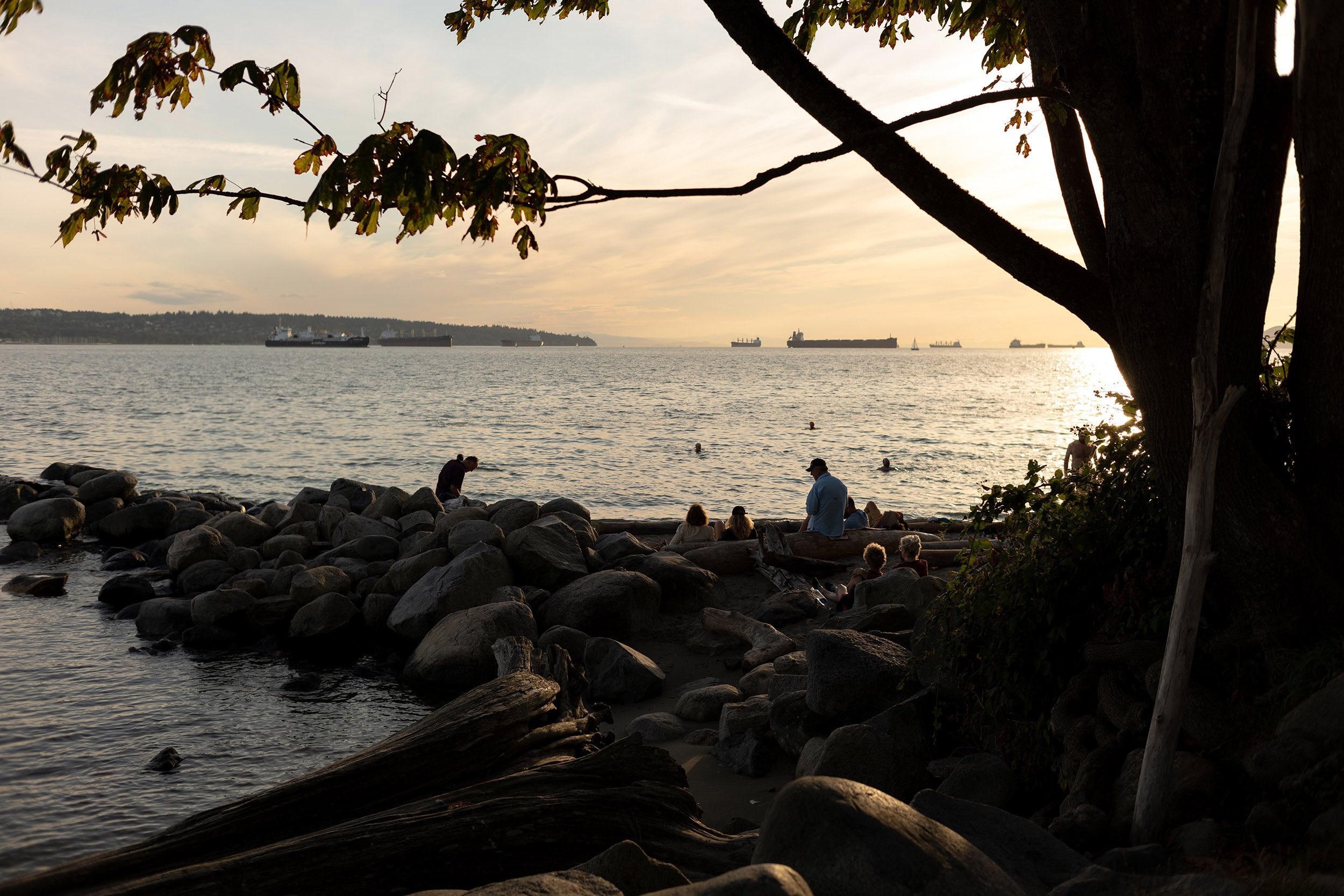 English Bay August evening swim. Sample image from a Voigtländer Nokton Classic 35mm f/1.4 II MC and Leica SL2-S.
