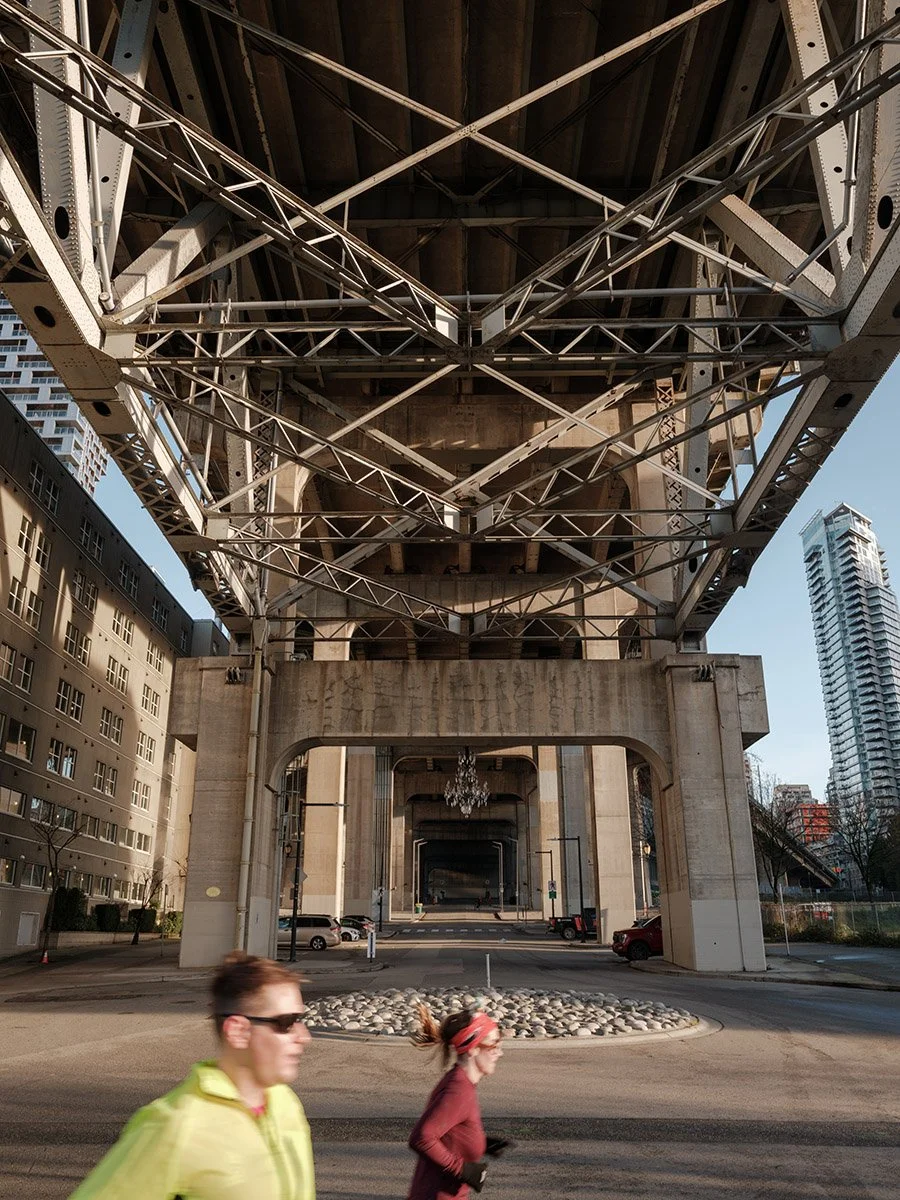 Runners by Granville Bridge in Vancouver. Sample image from a Fujifilm GFX100RF.