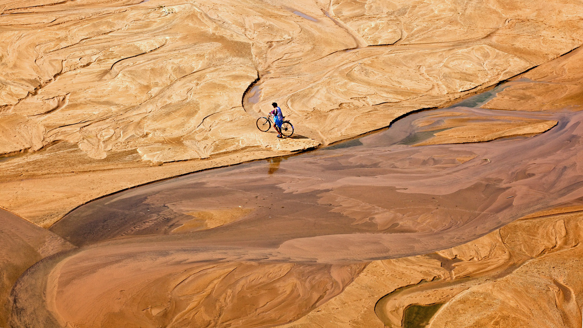 Crossing the holy Ganges "There are many rivers to cross to our successful destination."