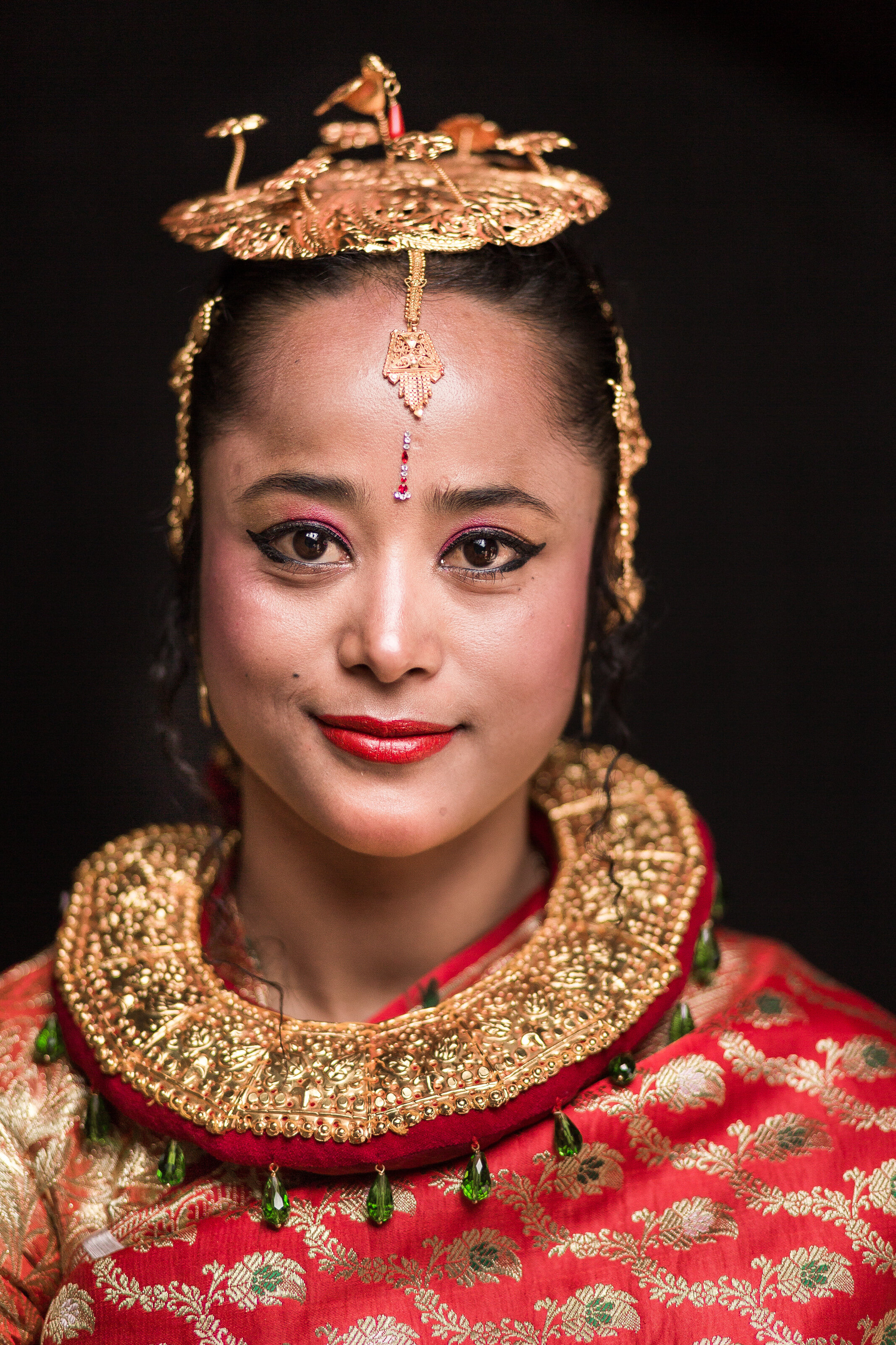  The bride of a wedding within the traditional Newari culture in Kathmandu, Nepal. 