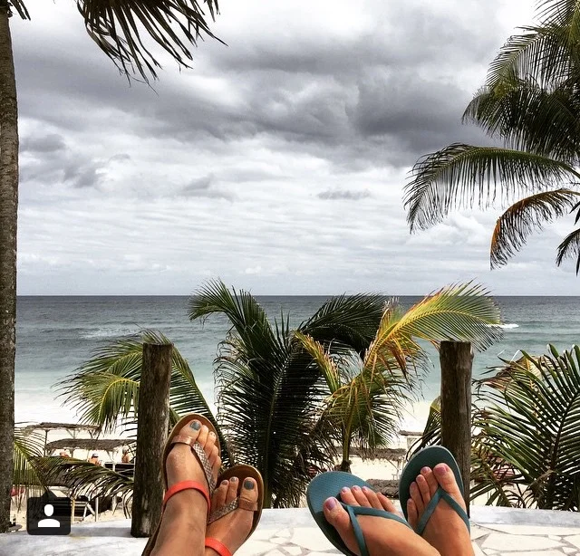Andrea + Brandi's enjoying the view from their beachside bungalow in Tulum.
