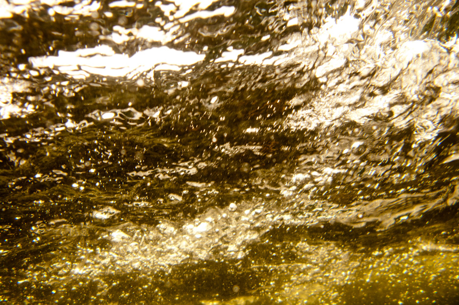  Brown with sediment brought by runoff, the swirling waters of Rock Creek progress towards the Clark Fork River. Rock Creek,&nbsp;2013 