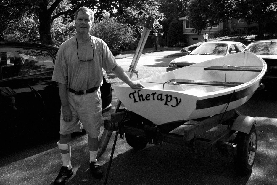 My dad proudly stands next to the boat he built over a two year period, a monumental task for a stroke survivor. He named it 'Therapy,' as he considered it part of his therapy for recovery and launched it into Lake Harriet in Minneapolis, Minn., on August 12, 2010.