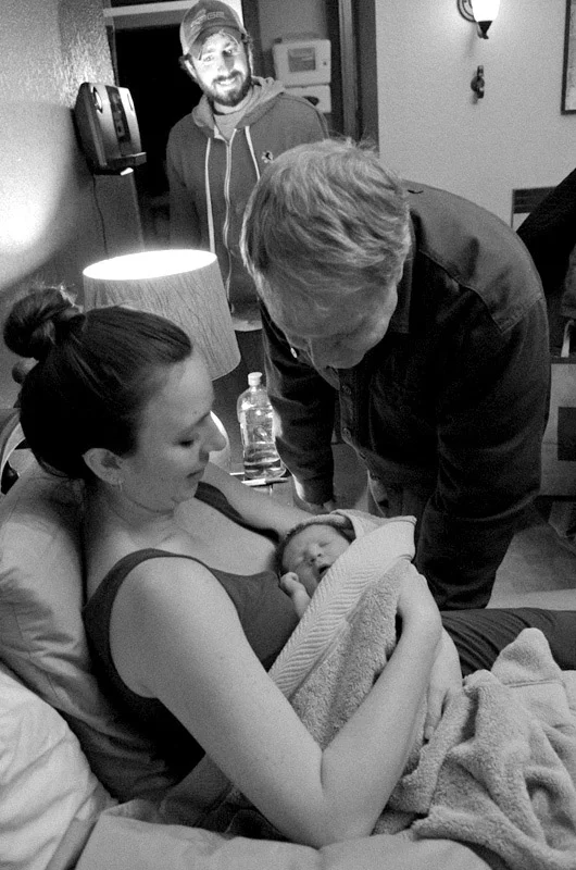  My brother Jimmy looks on while my sister-in-law, Chrissy, holds her newborn daughter, Leila, as my dad says goodbye to his granddaughter&nbsp;after seeing her for the first time. Being a grandfather has brought much joy to my dad's life, adding a n