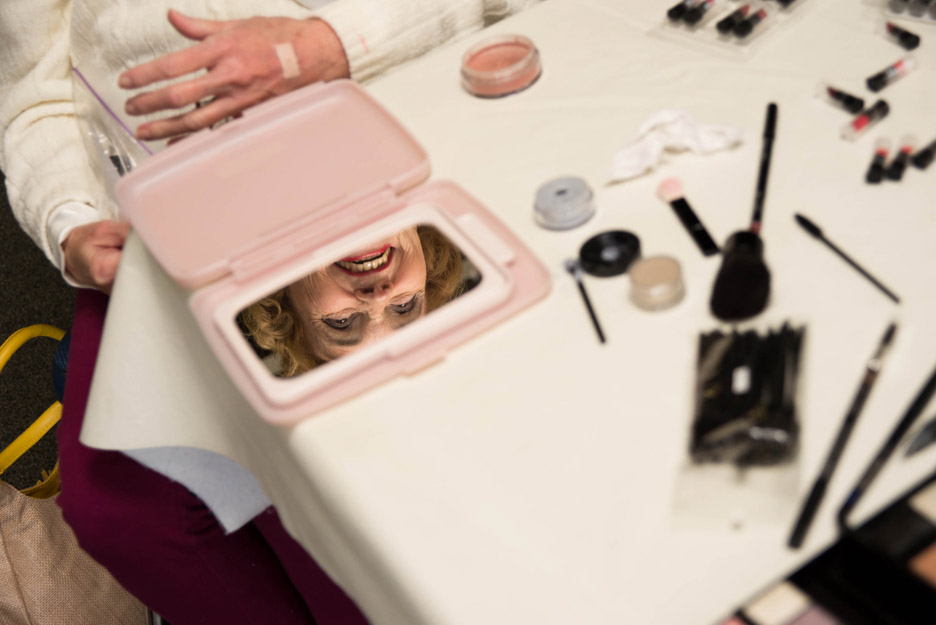 Ms Rochester SE Rosie Elwood, 75, smiles after getting makeup put on by Avon Representative Mary Lou Stewart during rehearsals for the Ms Senior Minnesota Pageant at the Rochester Senior Center, Friday, May 2, 2014, in Rochester, Minn.