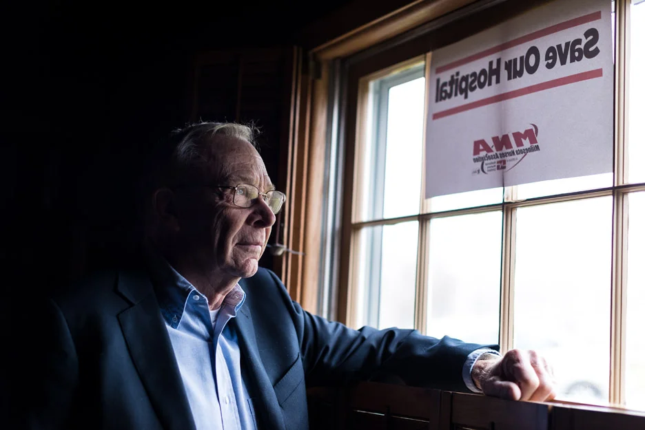 Bill Buege, a retired family physician, poses for a portrait in his home in Albert Lea, Minn., Tuesday, November 14, 2017. Buege worked under Mayo after it bought the hospital in 1995 until he retired in 2000, and was against the merger at the time. “I didn’t think it was gonna work,” Buege says. “I told them a tertiary medical center would not work in a small town.”