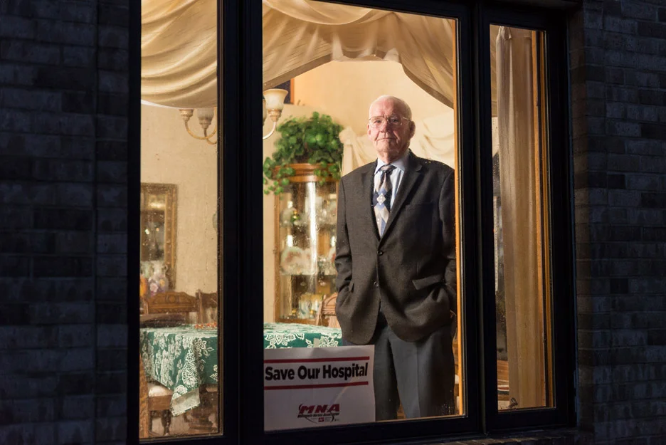 Paul Overgaard poses for a portrait in his home in Albert Lea, Minn., on Tuesday, November 14, 2017. Overgaard is a retired businessman, and served as a state representative for six years and as a senator for two years for Minnesota. He is a key advisor on the Save Our Hospital Steering Committee and is deeply concerned about the changes Mayo Clinic has made in his community. “No one has taken the time to fashion a modern day response to rural health care needs in the United States,” he says. “And it occurs to me that Mayo had a chance to play that role and instead they sought to buff up their model to increase revenue.”