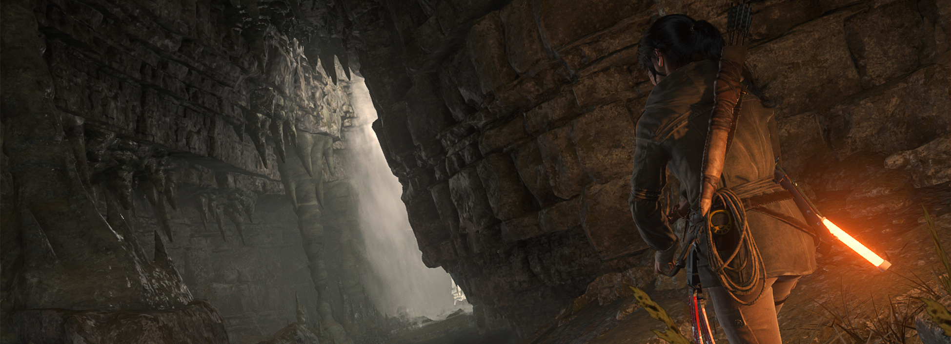 Lara Croft investigates cave in Rise of the Tomb Raider 2015