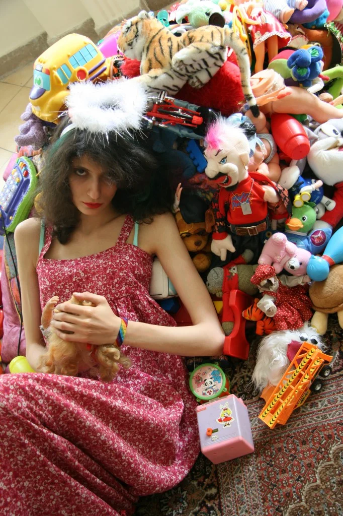Part of the photo installation project carpet, dolls, live model 2012