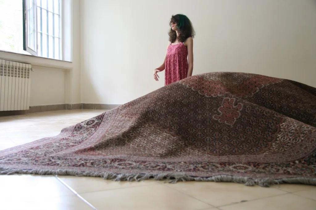 Part of the photo installation project carpet, dolls, live model 2012
