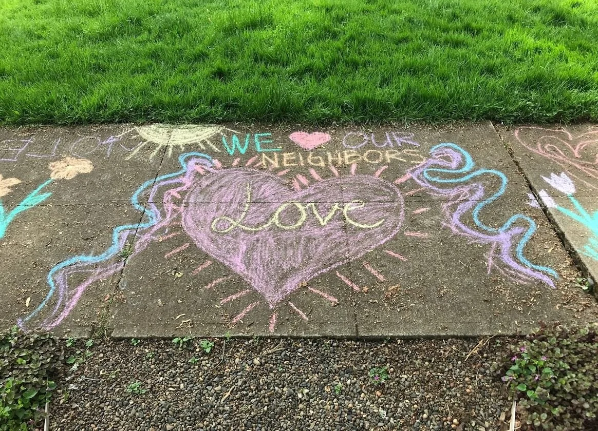 Neighbors surprised Lauren’s family with this thoughtful artwork outside their house.