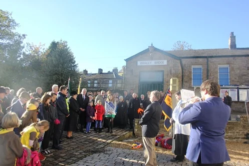 Act of Remembrance at War Memorial at the Jodrell Arms