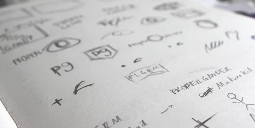 Detailed view of initial logo sketches