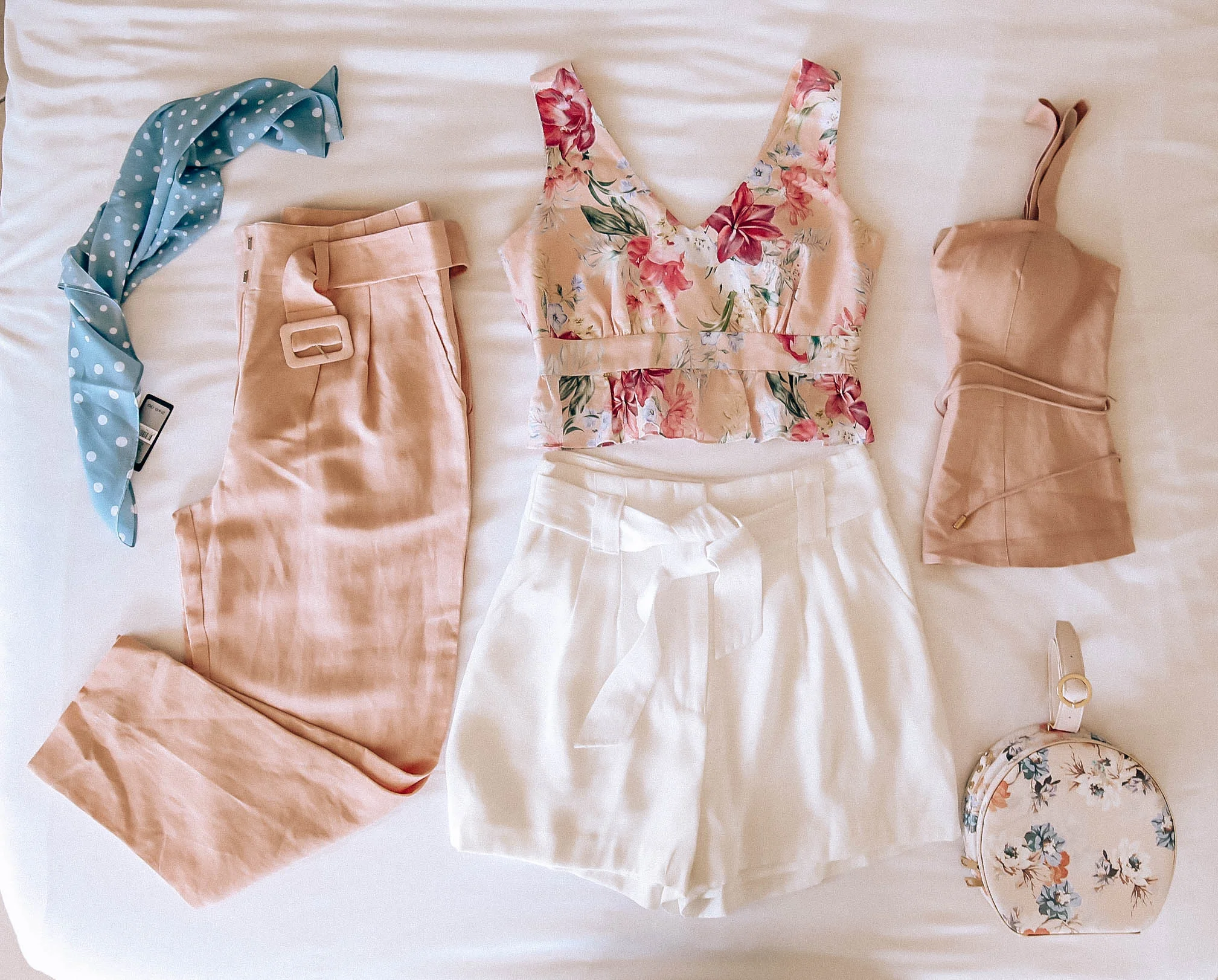 From left: Scarf , High waisted pants (on SALE) Floral Tank (on SALE) White Shorts (on SALE) Blush Bustier (on SALE) and Floral Bag