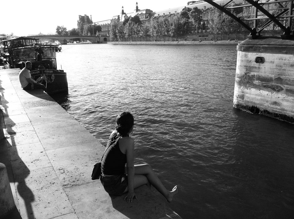 Watching the world go by at the Seine. Photo by Brian Carroll