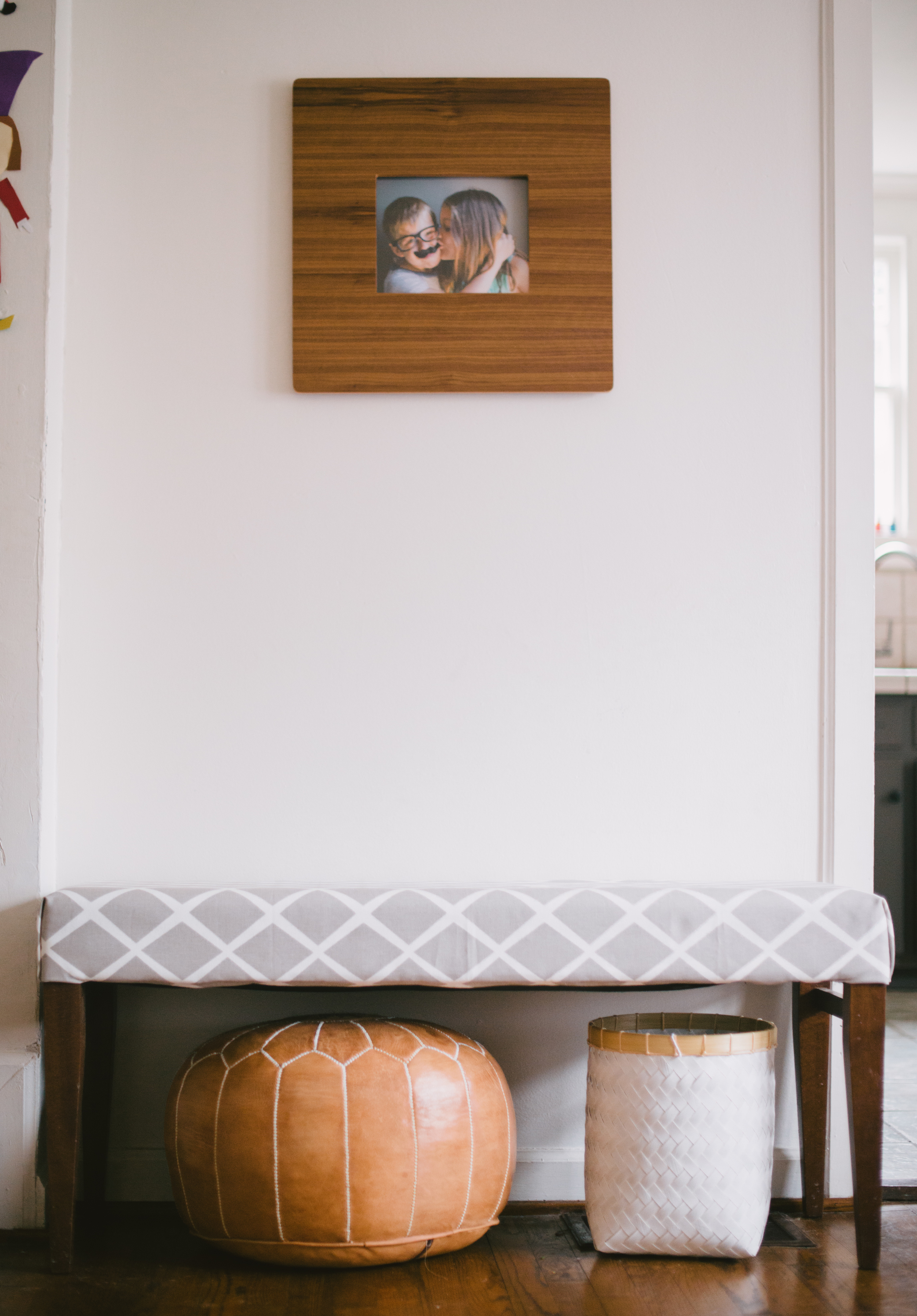 Sources: fabric: Serena and Lily | pouf { similar } | frame: Room and Board | basket: Homegoods { similar } | wall color: talc by Martha Stewart for Home Depot