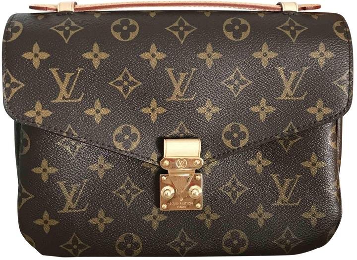 Louis Vuitton Metis Leather Handbag