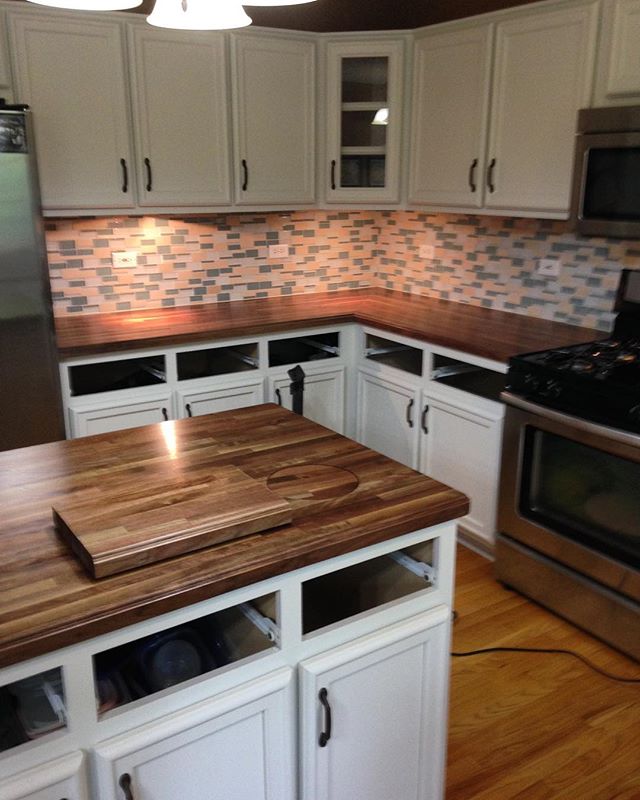 1.5&quot; Black Walnut counters and island with ogee edges and Durakryl 102 finish (clear satin polyurethane). Installation and miter done by Mike Corsi Remodeling.