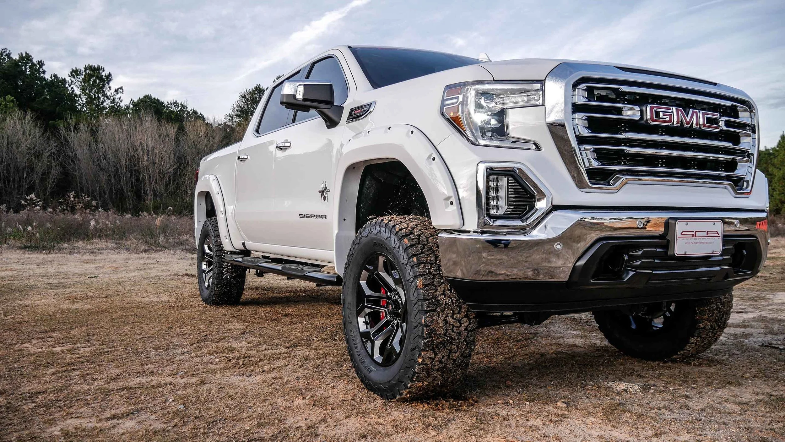 GMC BLACK WIDOW LIFTED TRUCKS — SCA Performance Black Widow Lifted Trucks