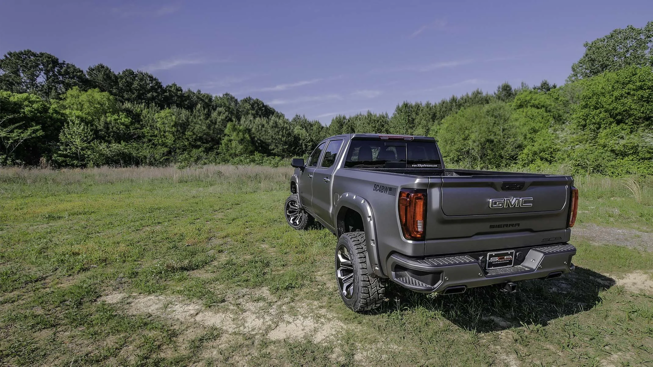 GMC BLACK WIDOW LIFTED TRUCKS — SCA Performance | Black Widow Lifted Trucks