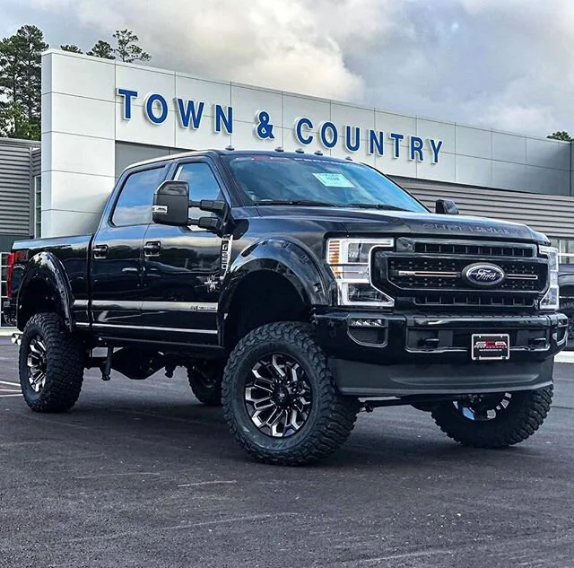 RAM BLACK WIDOW LIFTED TRUCKS — SCA Performance | Black Widow Lifted Trucks