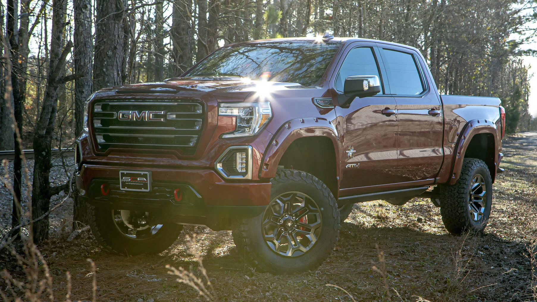 GMC BLACK WIDOW LIFTED TRUCKS — SCA Performance Black Widow Lifted Trucks