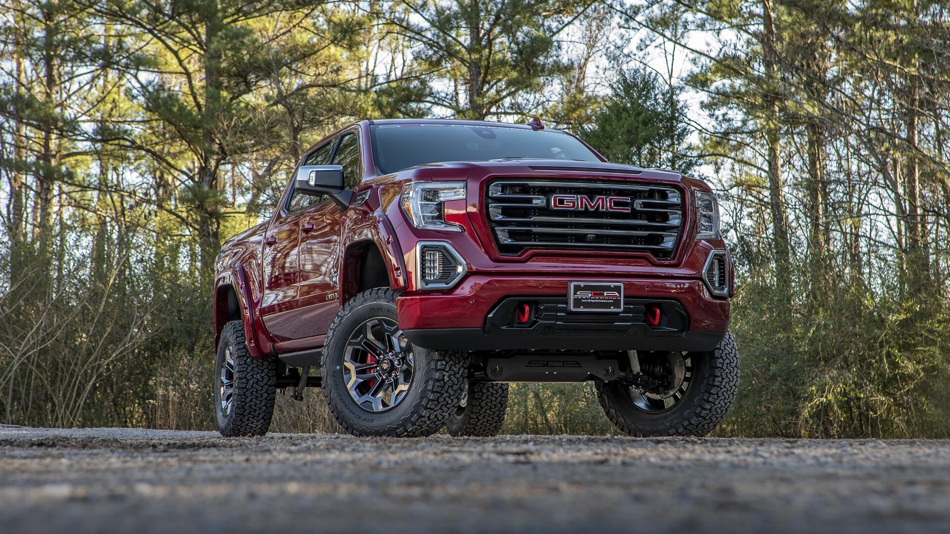 GMC BLACK WIDOW LIFTED TRUCKS — SCA Performance | Black Widow Lifted Trucks