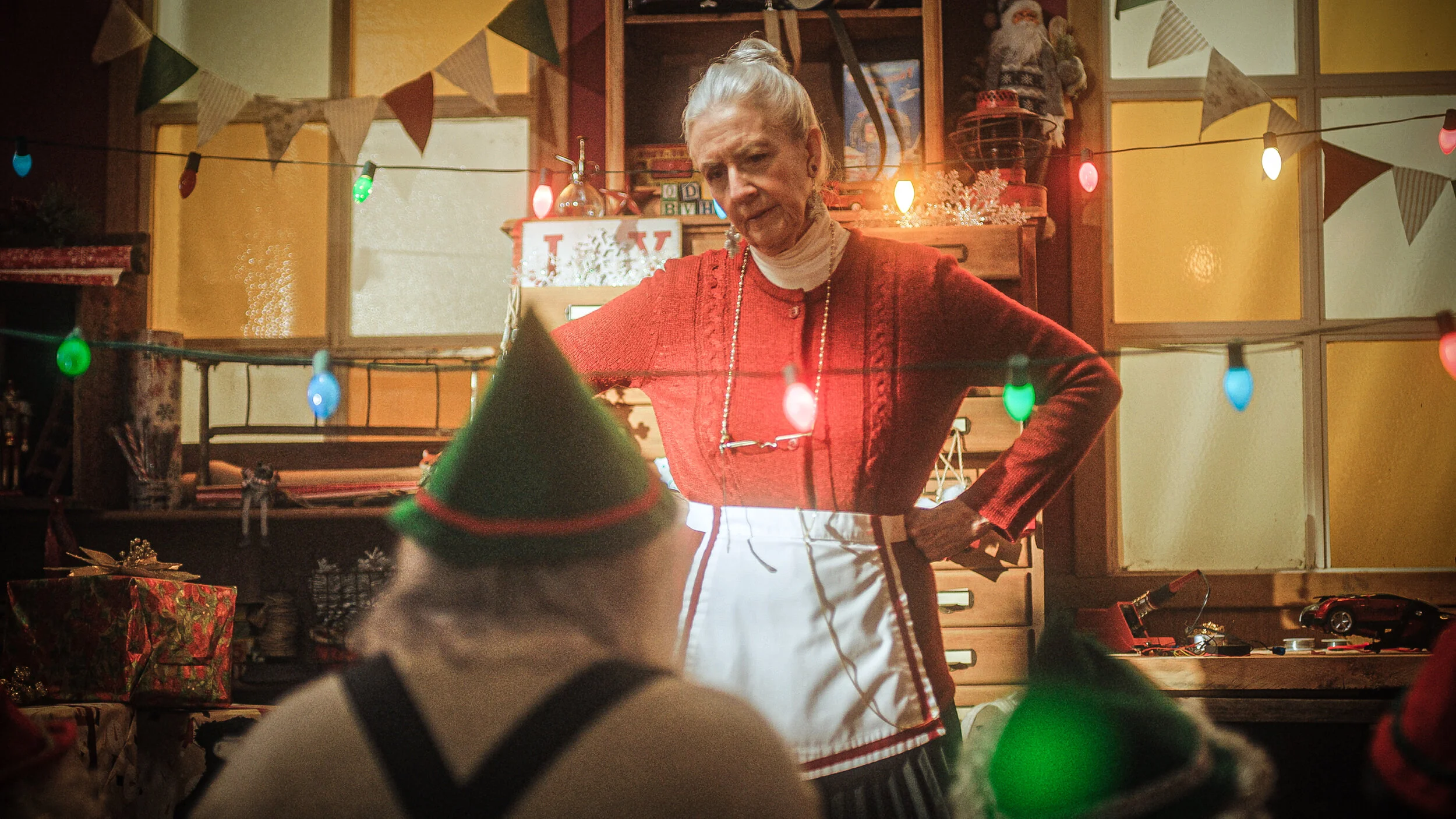 Mrs Claus (Irene Slater) catching a distracted Santa (Keith Alton).jpg