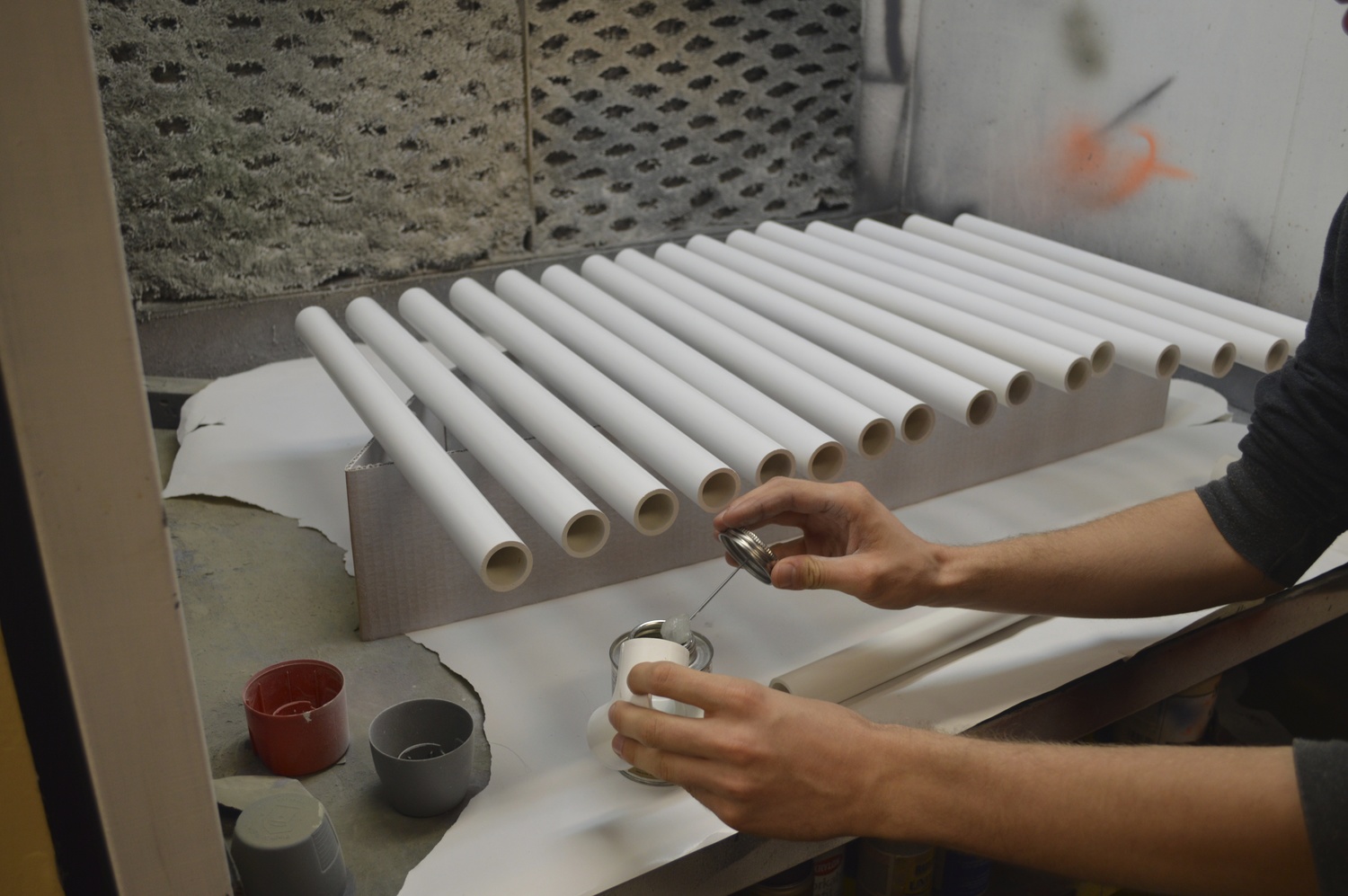 spray painting the PVC pipes