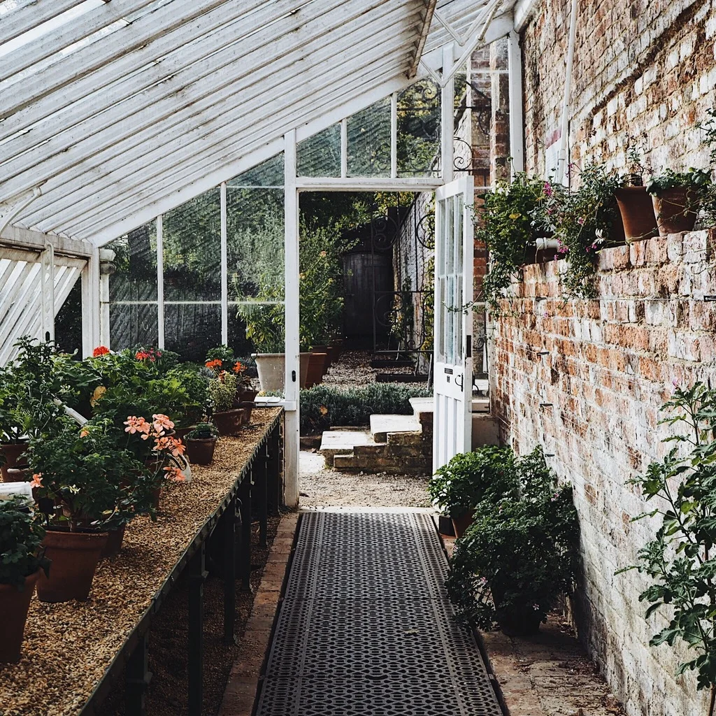 Inside a glass house looking towards the door.jpg