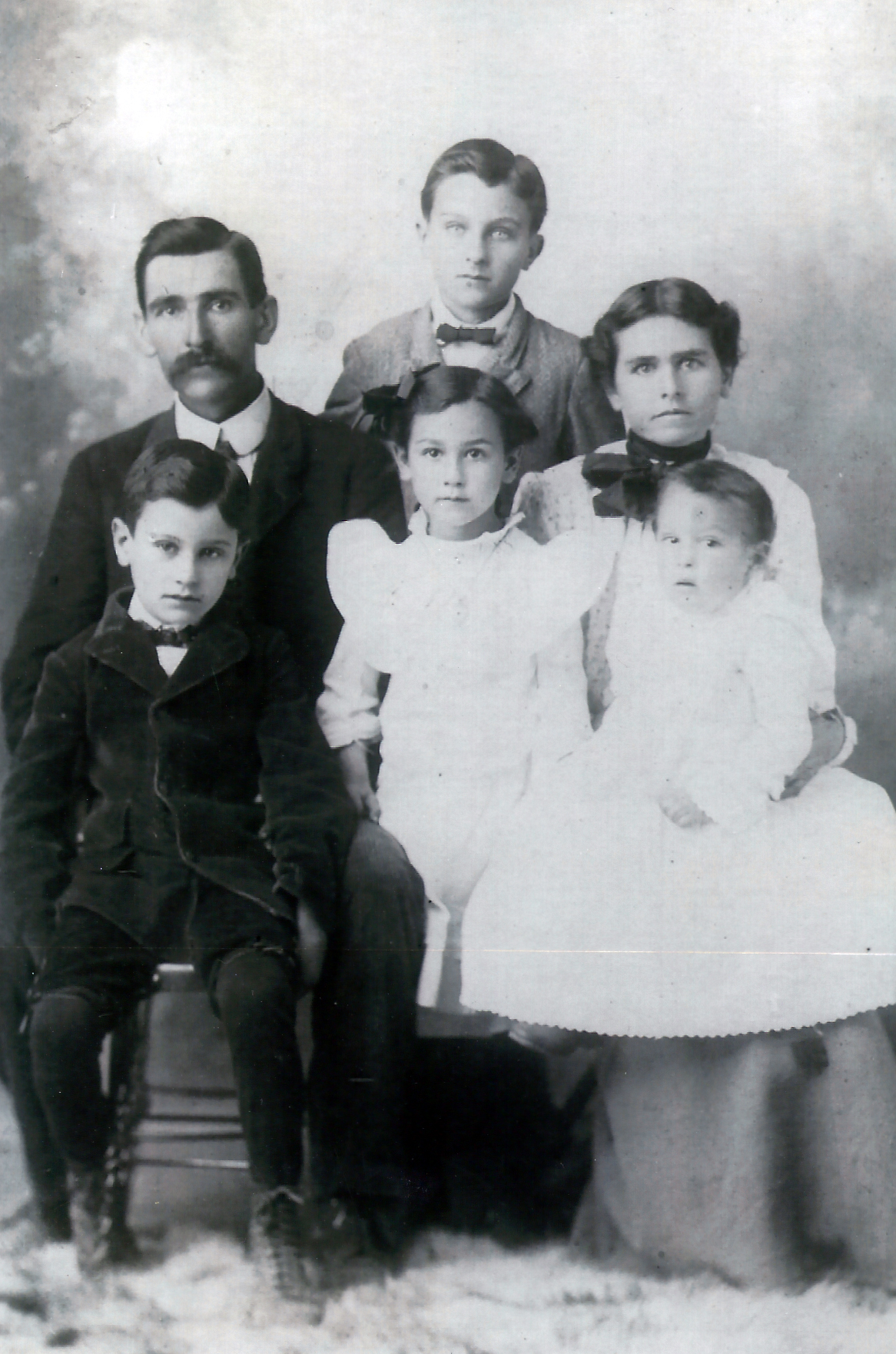 Commodore & Family with Cecil Standing in the rear. 