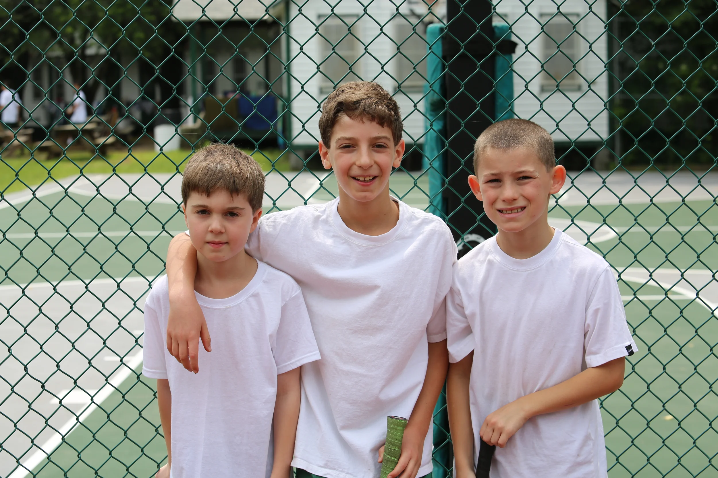 Sub Juniors take a break from tennis.