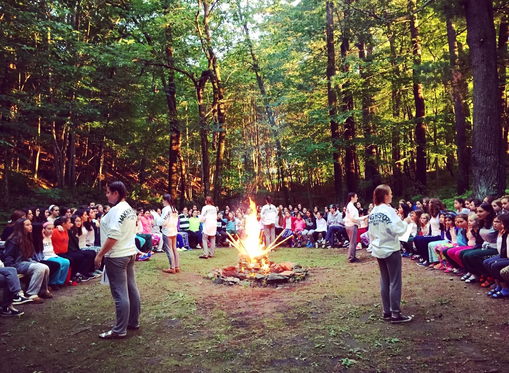 Soopers lead "Circle Game" at the girls' opening campfire.
