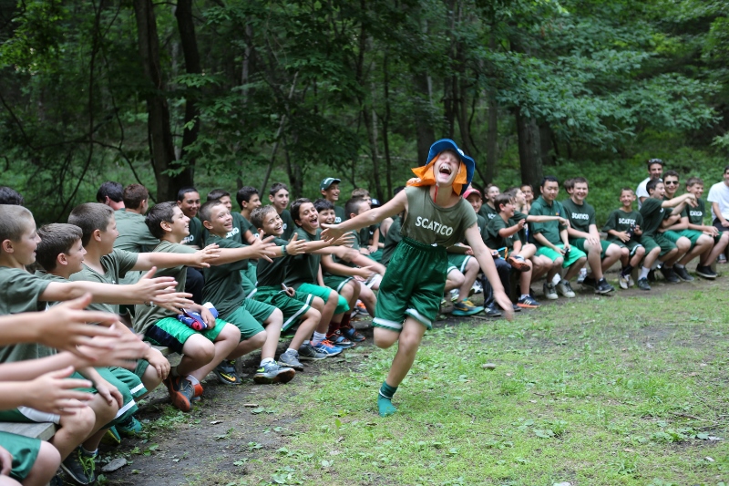 Screaming eagle (someone has to run around the campfire circle while holding one note) during College Bowl.