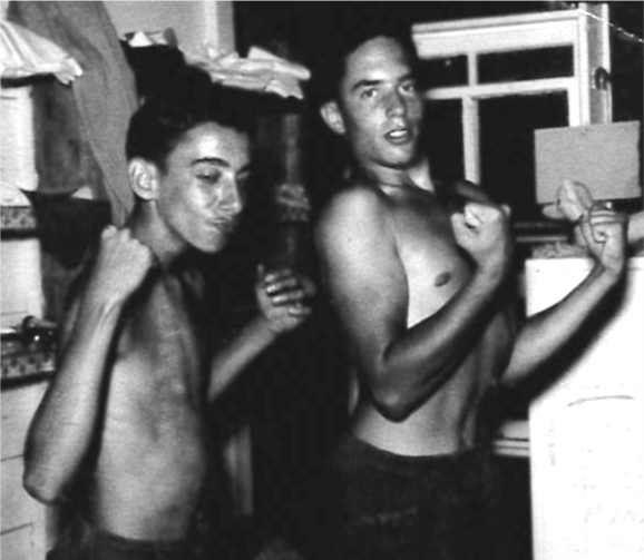 From Dennis Rinzler — 1950s: Ira Briskman and Dennis are flexing their muscles. 